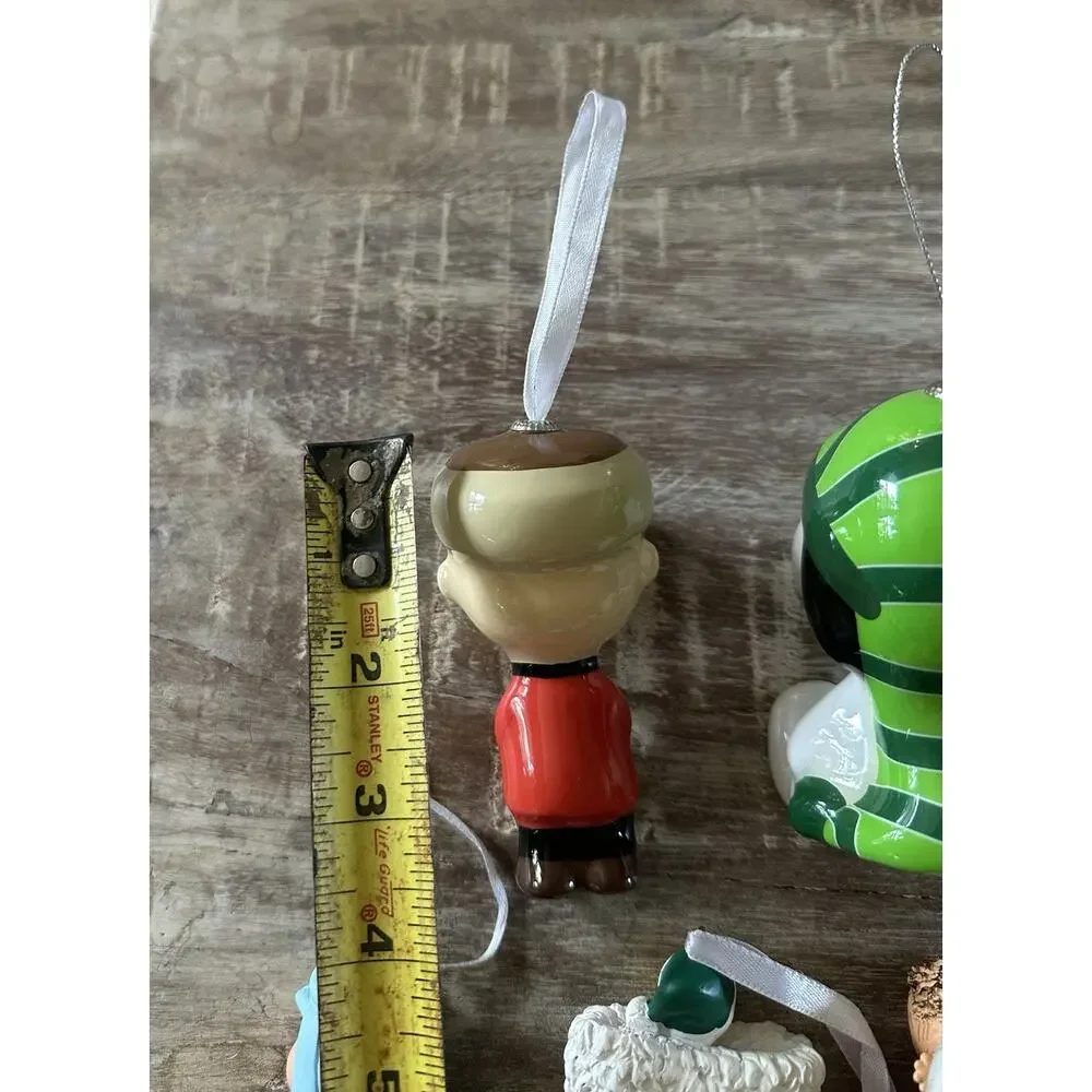 Lot 6 Hallmark Peanuts Worldwide Ornaments Snoopy Linus Etc